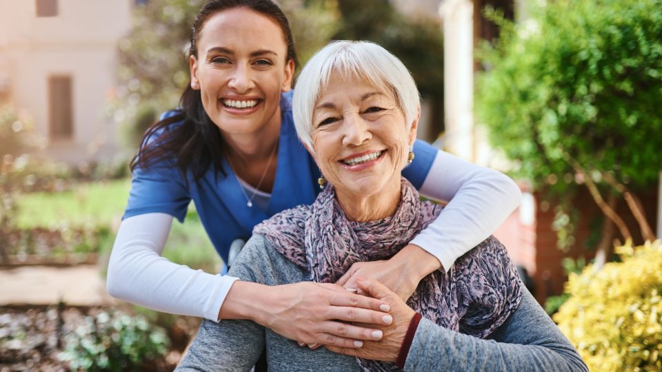 senior care staff with a female resident