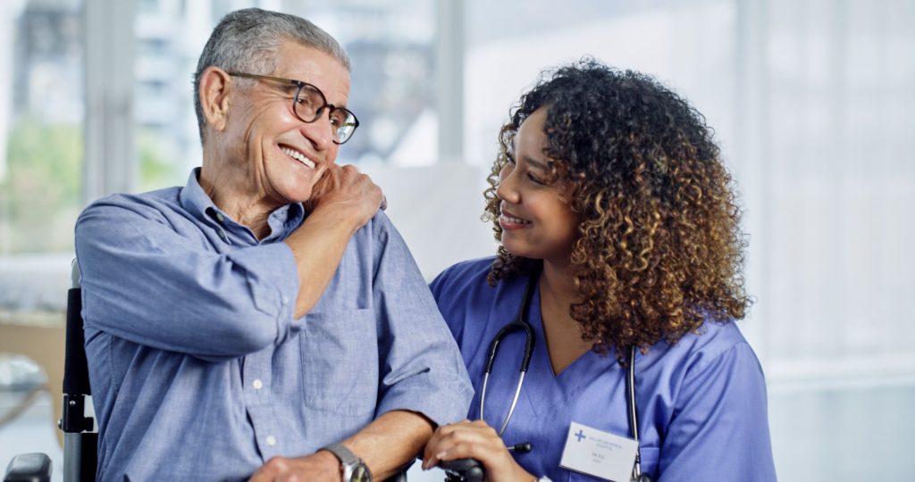 care staff with senior man