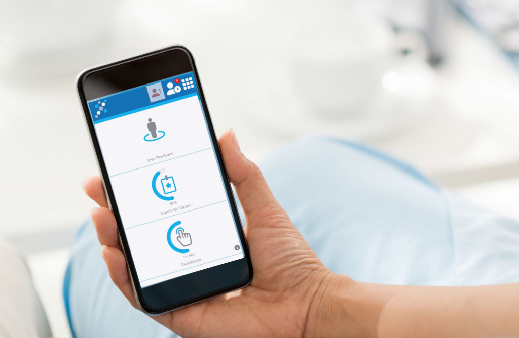 Nxtgen Care Staff M-Factor mobile app in the hand of a care worker